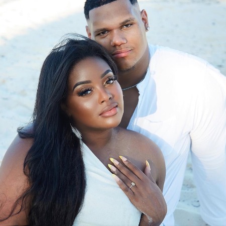 Jada Symone Rice poses with her husband Jasper Friis while flaunting wedding ring.